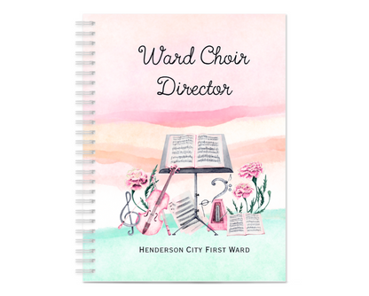 A spiral-bound notebook cover featuring a pastel watercolor design with pink and peach watercolor washes at the top and a mint green wash at the bottom. The center is decorated with illustrations of sheet music, an open book, a violin, flowers, and a hymn book, with the text 'Ward Choir Director' and 'HENDERSON CITY FIRST WARD'.